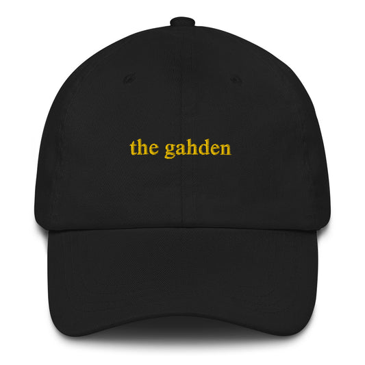 black baseball hat that says "the gahden" in gold embroidery