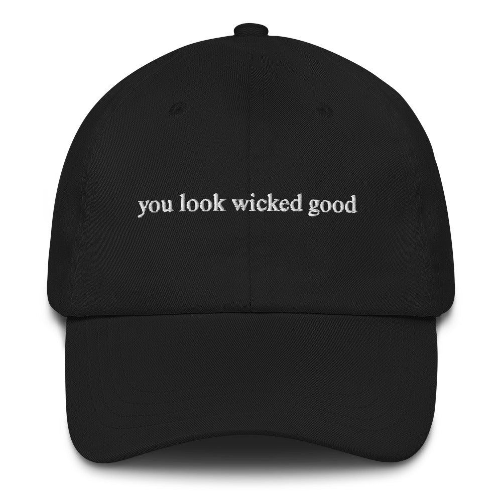 black hat that says "you look wicked good" in white lettering