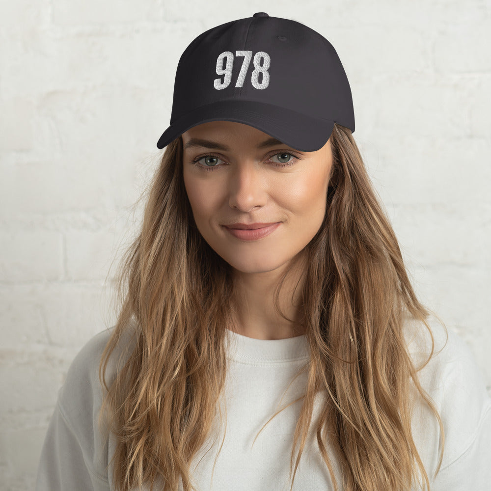 grey hat with "978" in white embroidery