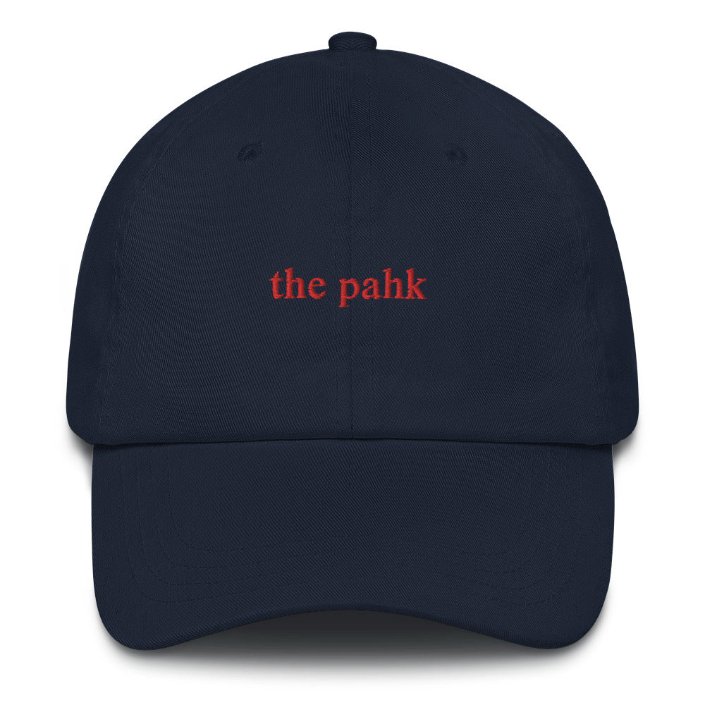 navy blue baseball hat that says "the pahk" with red embroidery