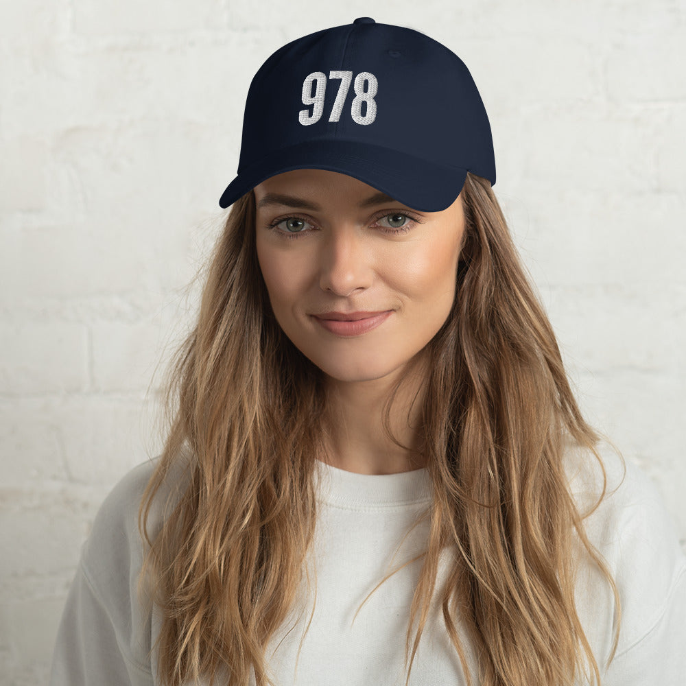 blue hat with "978" in white embroidery