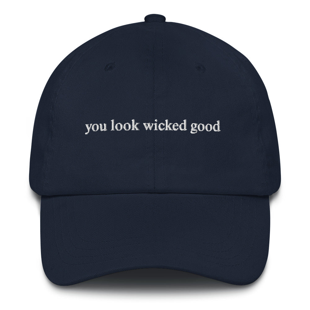 navy hat that says "you look wicked good" in white lettering