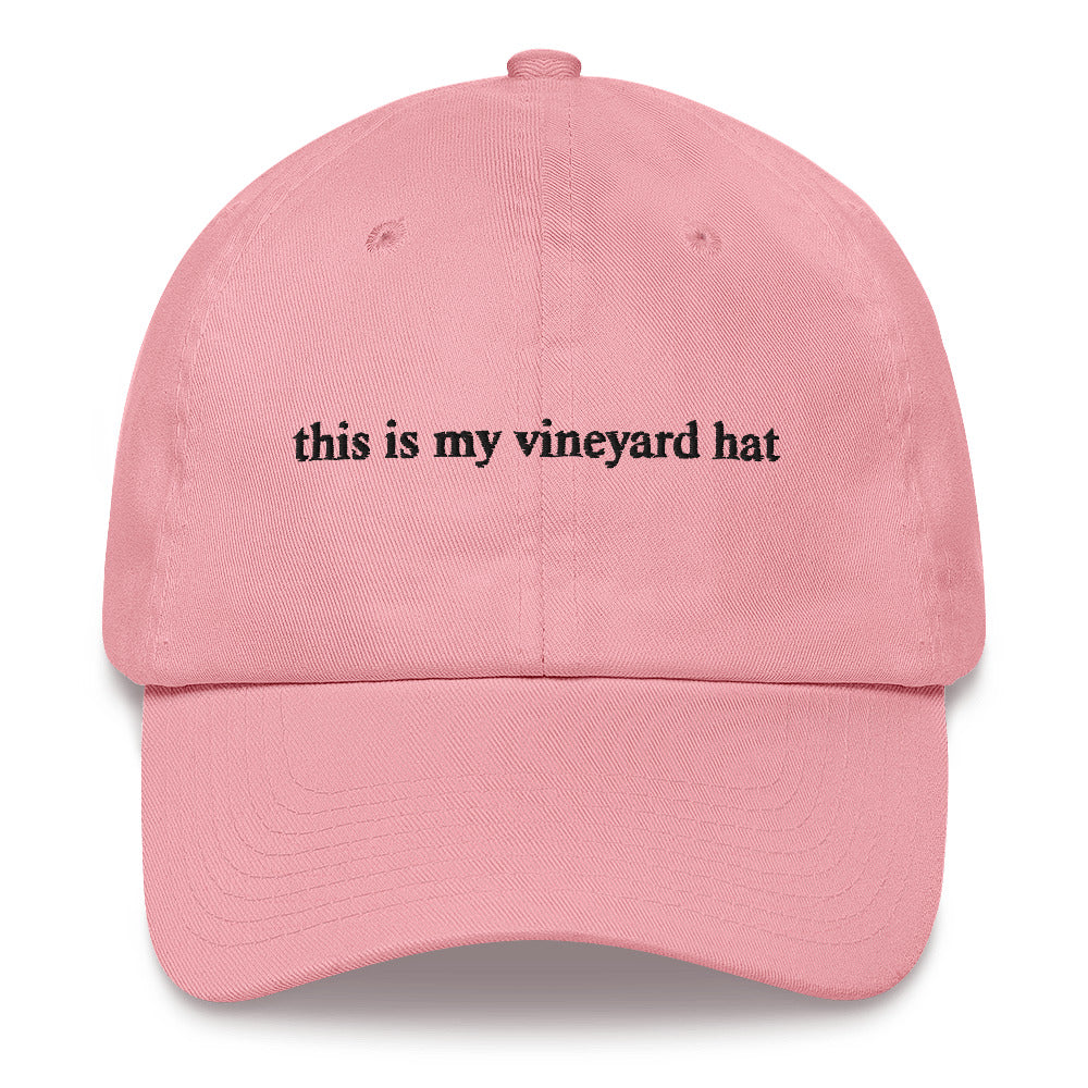 pink baseball hat that says "this is my vineyard hat" in black embroidery