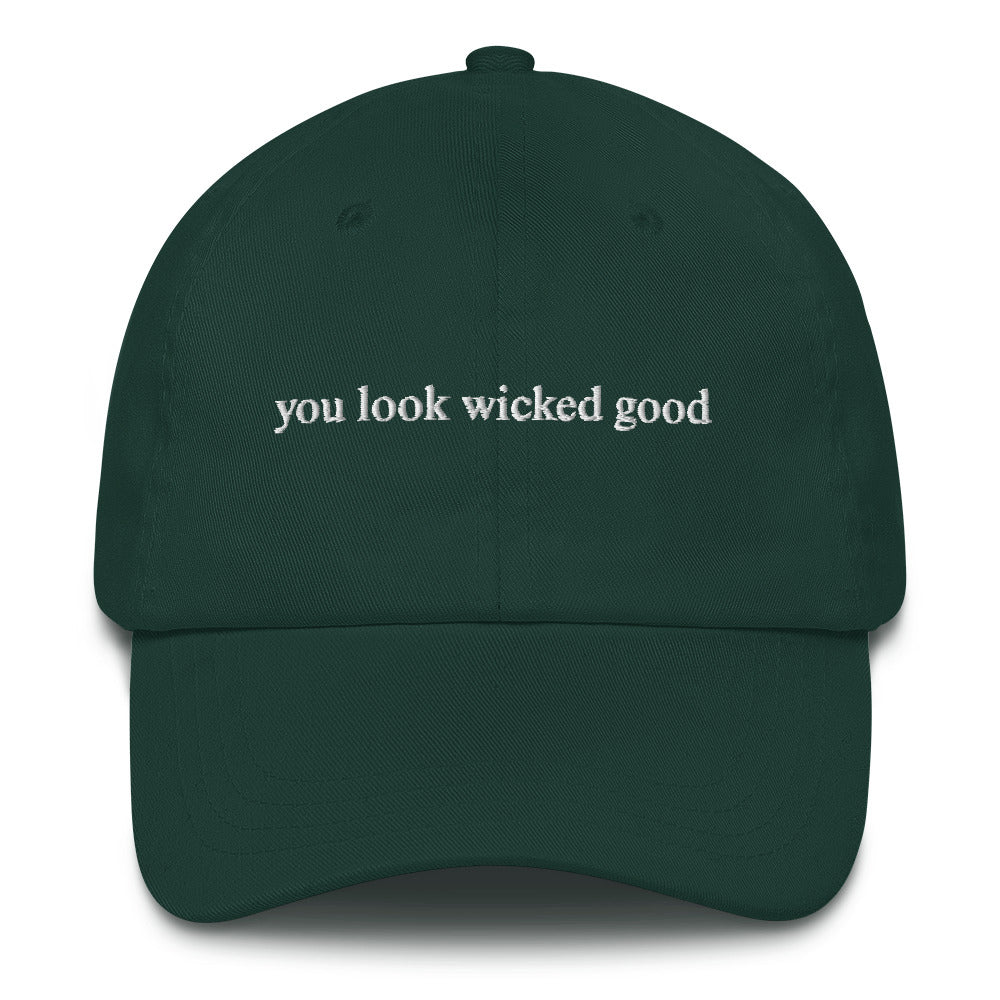 green hat that says "you look wicked good" in white lettering