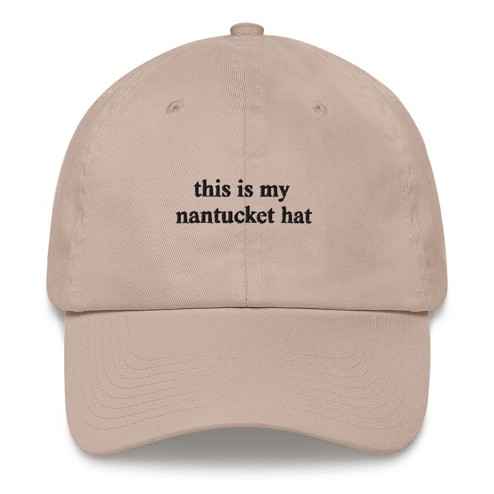 tan baseball hat that says "this is my nantucket hat" in black embroidery