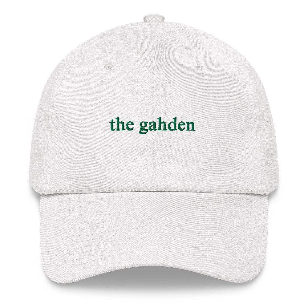white hat that says "the gahden" in green embroidery