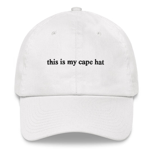 white baseball hat that says "this is my cape hat" in black embroidery