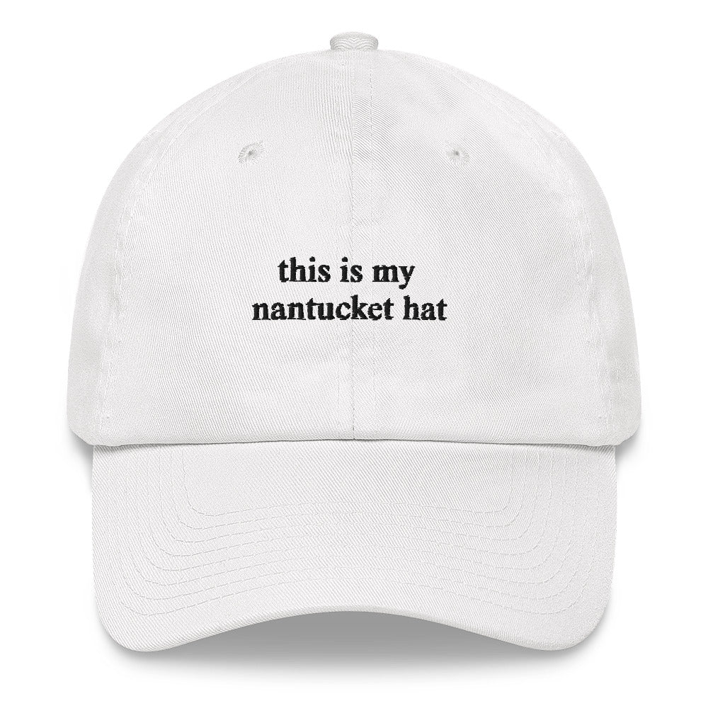 pink baseball hat that says "this is my nantucket hat" in black embroidery