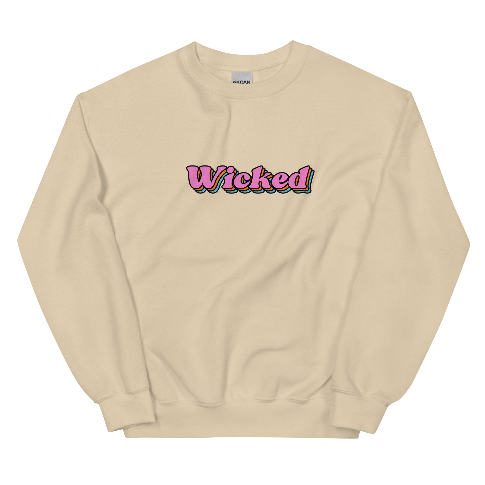 tan crewneck that says "wicked" in pink lettering