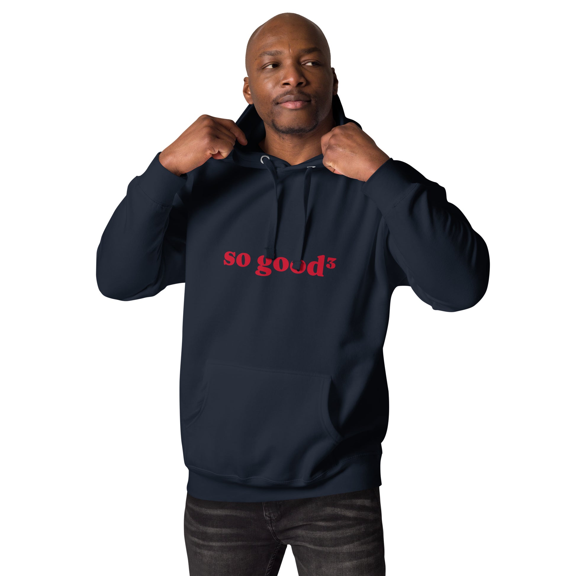 man wearing navy blue hoodie that says "so good cubed" in red lettering