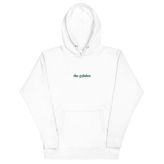 white hoodie that says "the gahden" in green embroidery