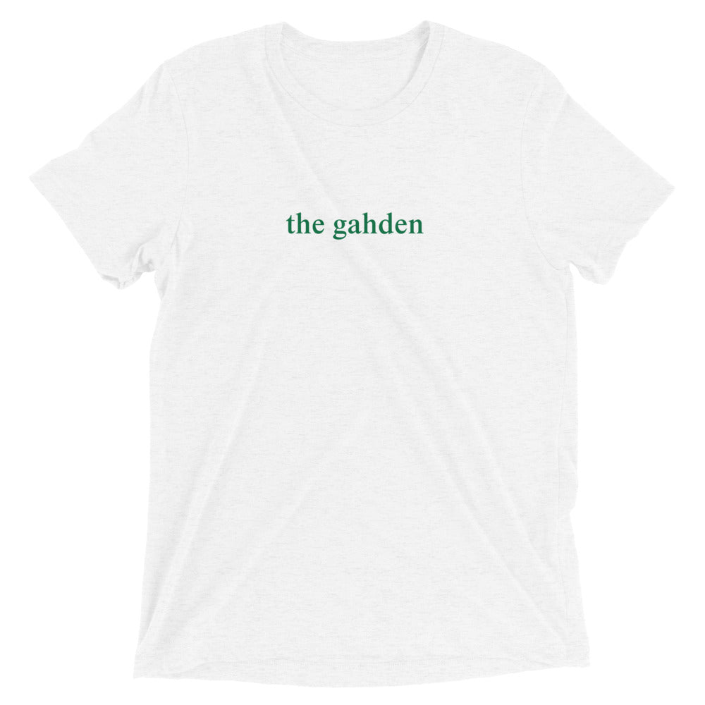 white tshirt that says "the gahden" in green lettering
