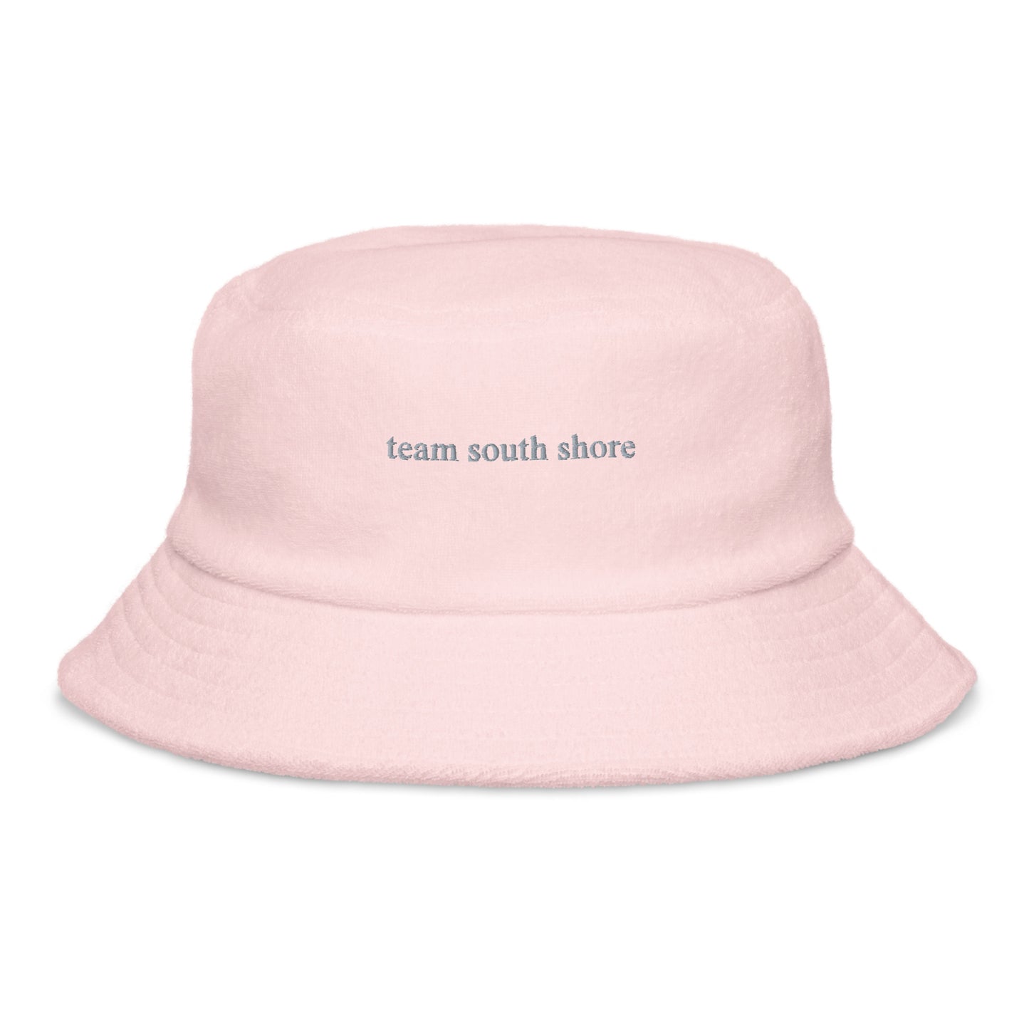 pink bucket hat that says "team south shore" in grey lettering